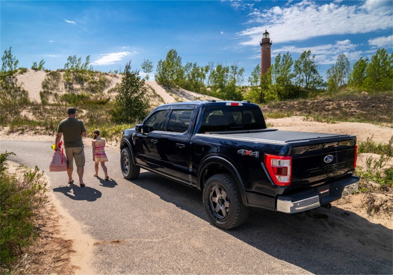 Load image into Gallery viewer, Roll-N-Lock 99-07 Chevy Silverado/Sierra (w/OE Rail Caps) LB 96-3/4in M-Series Tonneau Cover

