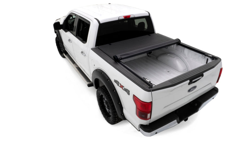 Load image into Gallery viewer, Lund 04-18 Ford F-150 (5.5ft. Bed) Genesis Roll Up Tonneau Cover - Black
