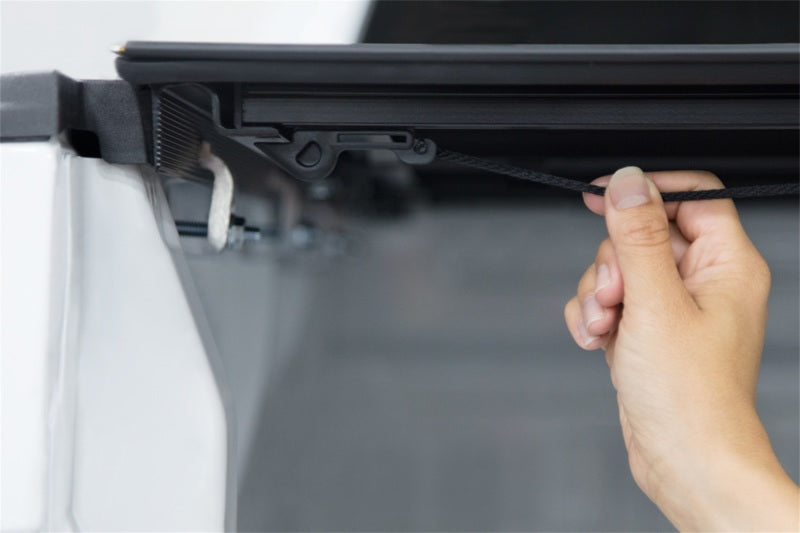 Load image into Gallery viewer, Access LOMAX Tri-Fold Cover 2020+ Chev/GMC Full Size 2500 3500 6ft 8in Standard Bed - Matte Black
