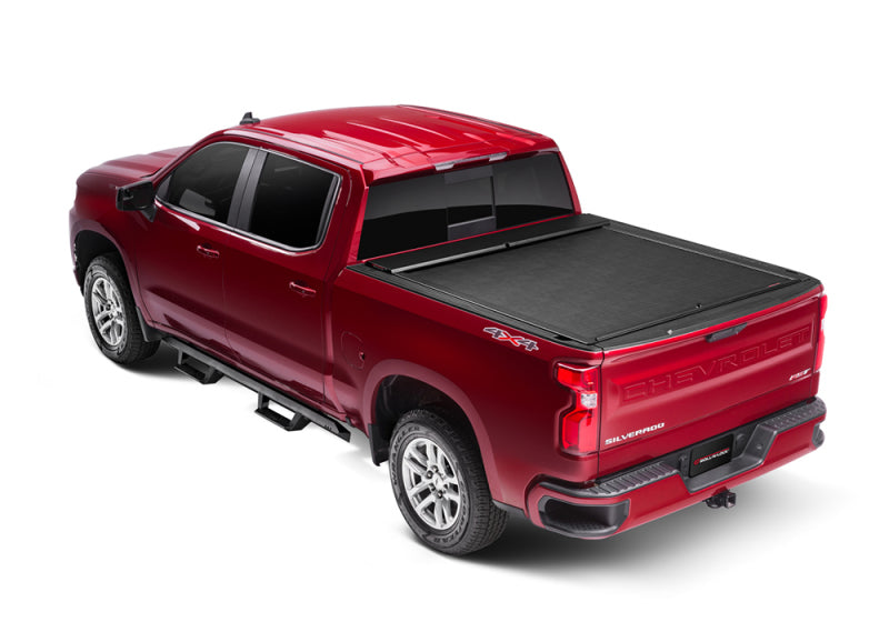 Load image into Gallery viewer, Roll-N-Lock 15-18 Chevy Silverado/Sierra 2500/3500 LB 96-3/8in M-Series Retractable Tonneau Cover
