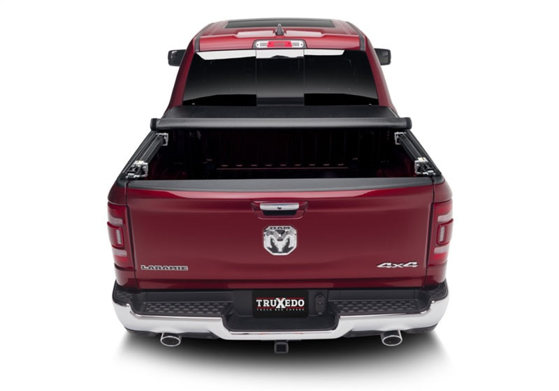 Load image into Gallery viewer, Truxedo 19-20 Ram 1500 (New Body) w/RamBox 5ft 7in TruXport Bed Cover

