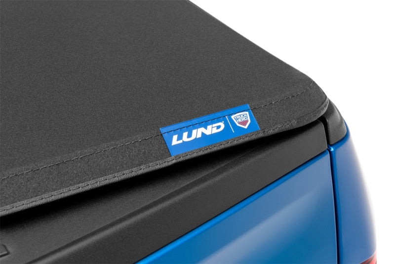 Load image into Gallery viewer, Lund 02-17 Dodge Ram 1500 (6.5ft. Bed Excl. Rambox) Genesis Elite Tri-Fold Tonneau Cover - Black
