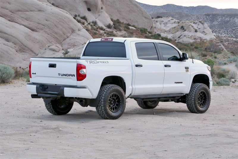 Load image into Gallery viewer, Fabtech 16-19 Toyota Tundra 4WD Trd Pro 4in Perf Sys w/Dlss 2.5 C/Os &amp; Rr Dlss
