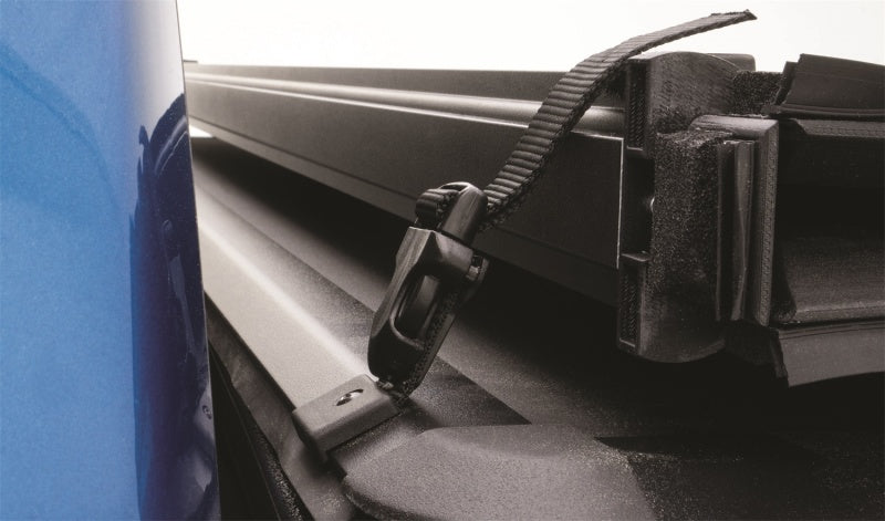 Load image into Gallery viewer, Lund 16-23 Toyota Tacoma (5ft. Bed) Hard Fold Tonneau Cover - Black
