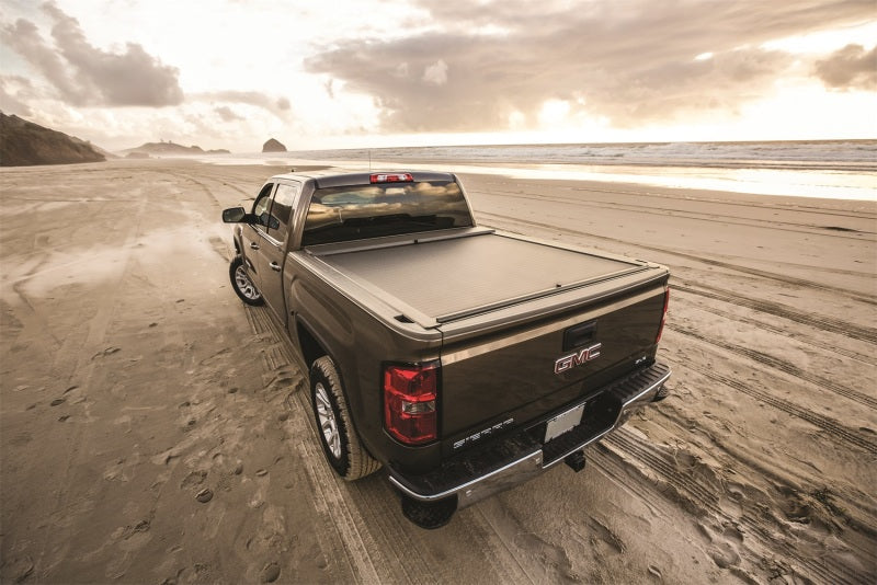 Load image into Gallery viewer, Roll-N-Lock 07-18 Toyota Tundra Crew Max Cab XSB 65in A-Series Retractable Tonneau Cover
