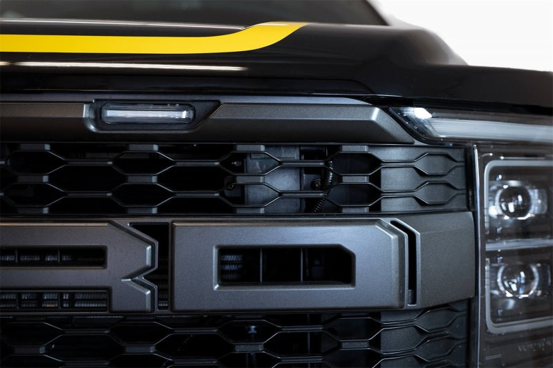 Load image into Gallery viewer, Addictive Desert Designs 21-22 Ford Raptor Adaptive Cruise Control Relocation Bracket
