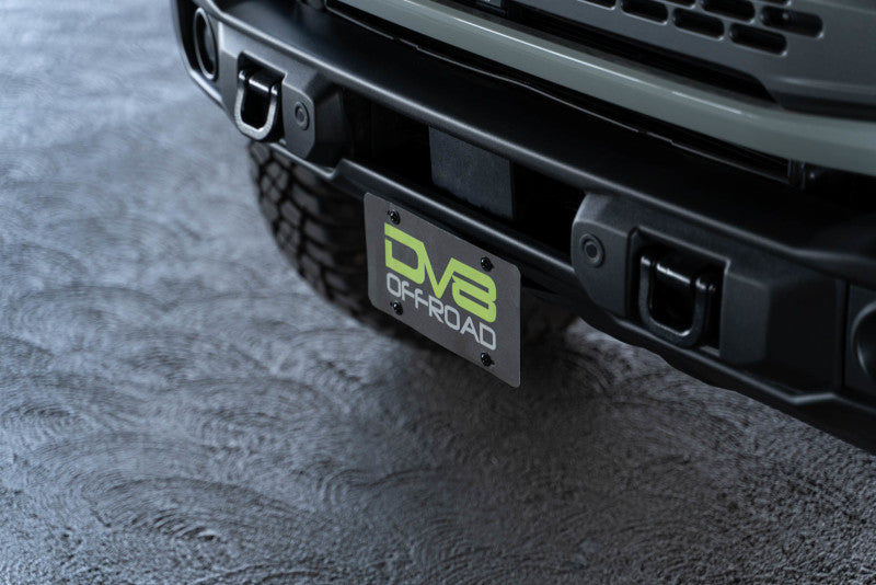 Load image into Gallery viewer, DV8 Offroad 21-23 Ford Bronco Capable Bumper Front License Plate Mount
