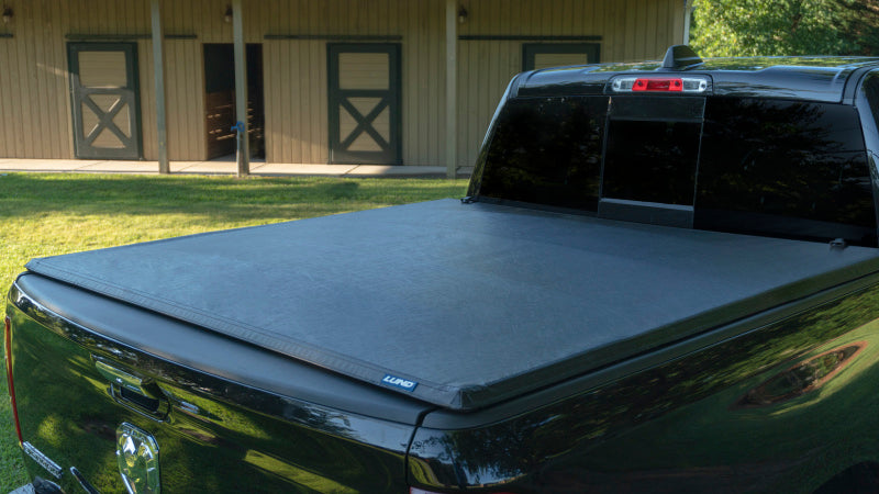 Load image into Gallery viewer, Lund 02-17 Dodge Ram 1500 (8ft. BedExcl. Beds w/Rambox) Genesis Tri-Fold Tonneau Cover - Black
