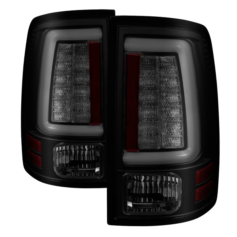 Load image into Gallery viewer, Spyder 13-14 Dodge Ram 1500 Light Bar LED Tail Lights - Black Smoke ALT-YD-DRAM13V2-LED-BSM
