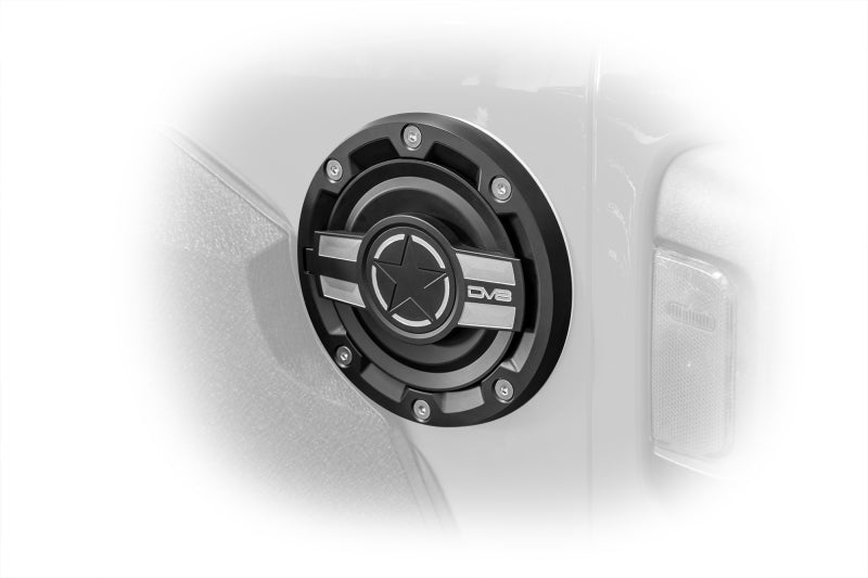 Load image into Gallery viewer, DV8 Offroad 2018+ Jeep JL Aluminum Fuel Door for 20-Pres Wrangler
