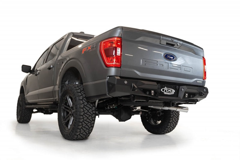 Load image into Gallery viewer, Addictive Desert Designs 2021 Ford F-150 Stealth Fighter Rear Bumper w/ Back up Sensors
