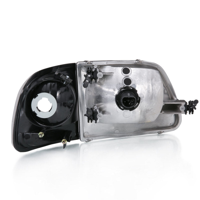 Load image into Gallery viewer, ANZO 1997-2003 Ford F-150 Crystal Headlight G2 Clear With Parking Light
