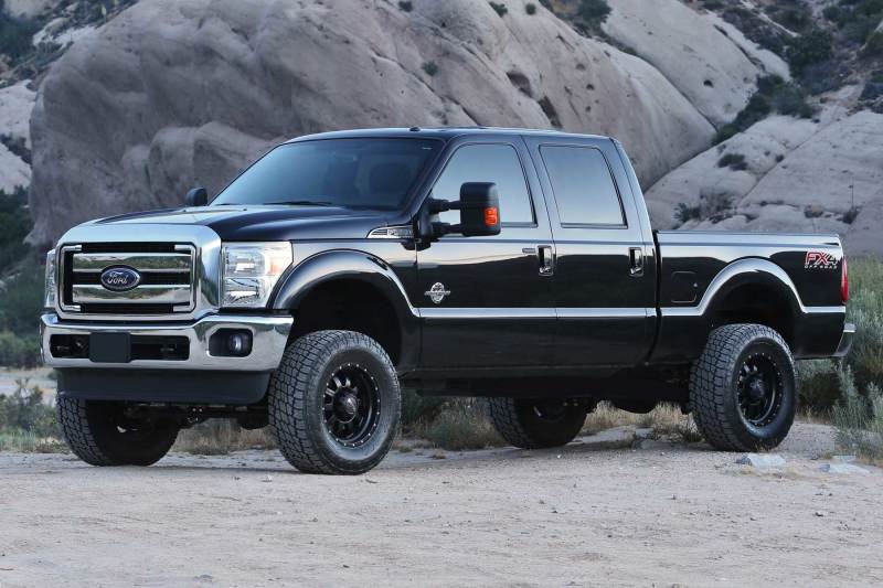 Load image into Gallery viewer, Fabtech 08-16 Ford F250/F350 4WD 4in Basic Sys w/Perf Shks
