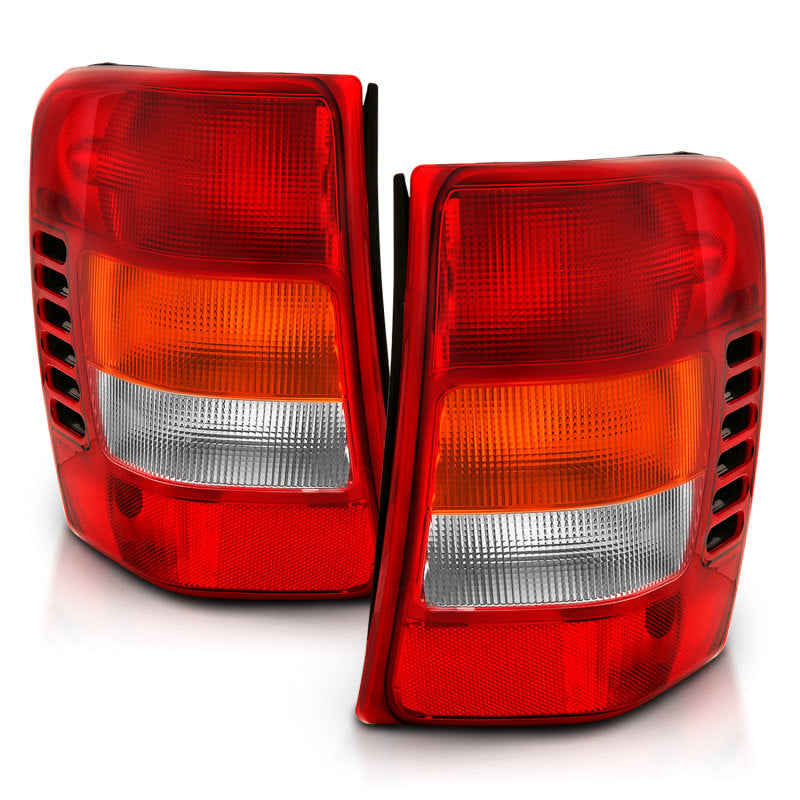 Load image into Gallery viewer, ANZO 1999-2004 Jeep Grand Cherokee Taillight Red/Clear Lens (OE Replacement)
