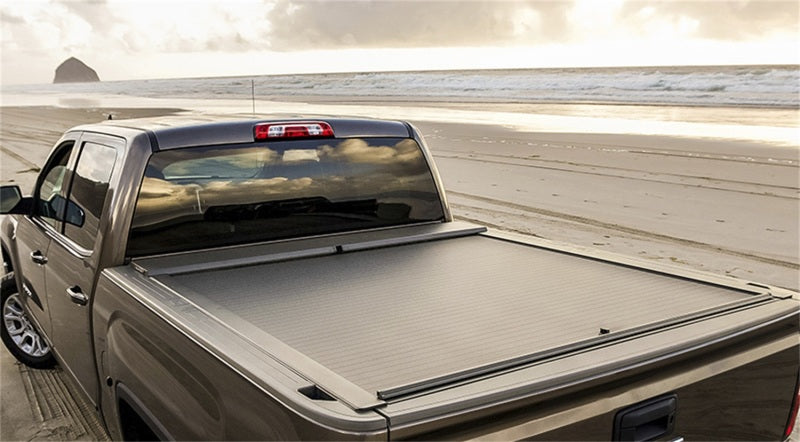 Load image into Gallery viewer, Roll-N-Lock 2020 GM Silverado / Sierra 2500/3500 6ft 10in Bed A-Series Retractable Tonneau Cover
