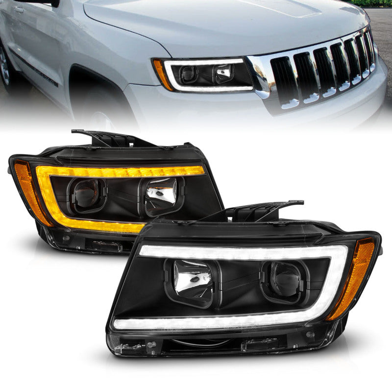 Load image into Gallery viewer, ANZO 11-13 Jeep Grand Cherokee (Factory Halogen Only) Projector Headlights w/Light Bar Swtchbk Black
