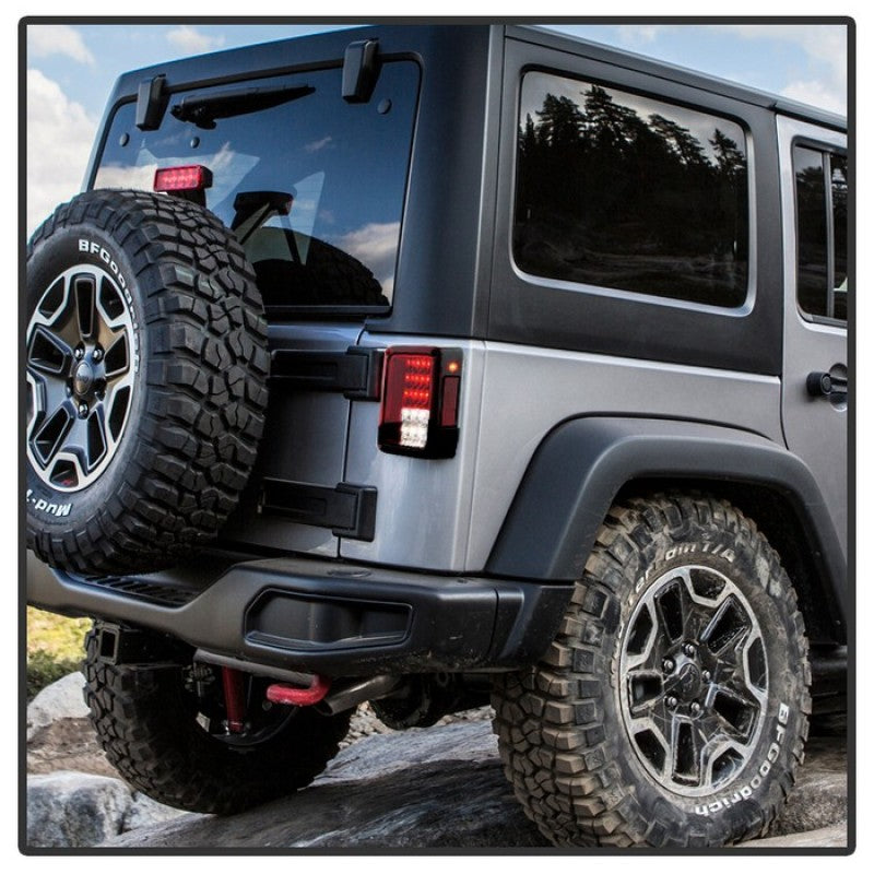 Load image into Gallery viewer, Spyder Jeep Wrangler 07-15 LED Tail Lights Red Clear ALT-YD-JWA07-LED-RC
