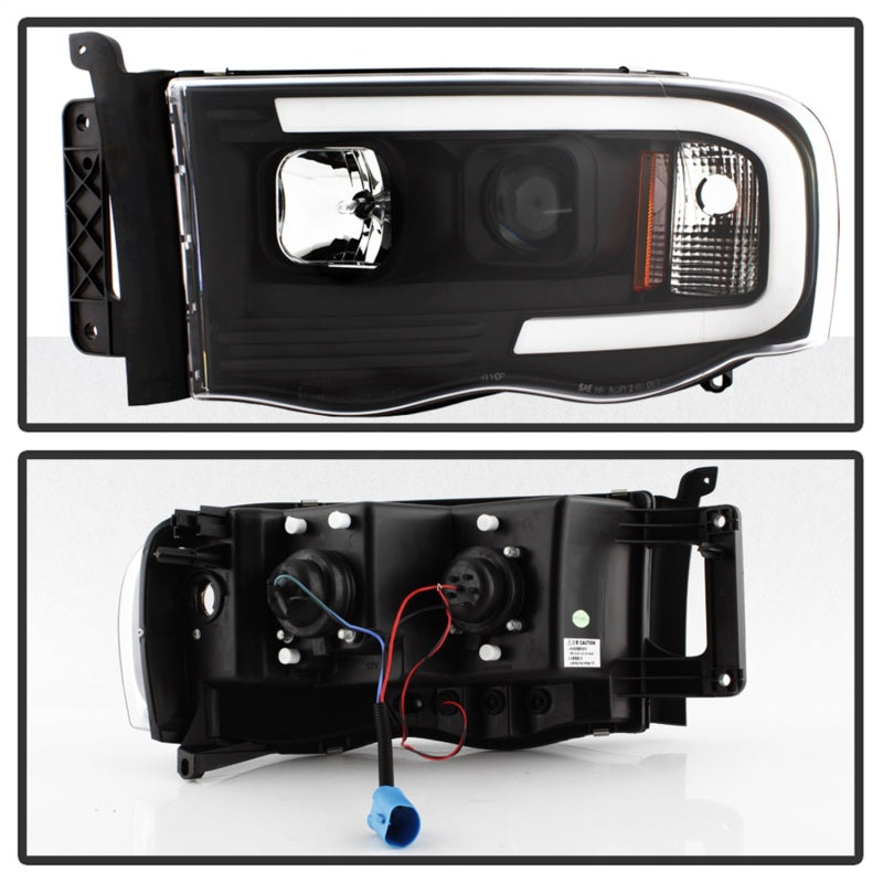 Load image into Gallery viewer, Spyder 02-05 Dodge Ram 1500 Light Bar Projector Headlights - Black (PRO-YD-DR02V2-LB-BK)
