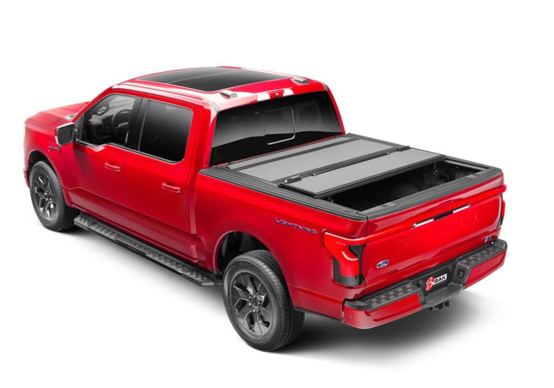 Load image into Gallery viewer, BAK 21-22 Ford F-150 (Incl. 2022 Lightning) BAKFlip MX4 5.7ft Bed Cover - Matte Finish
