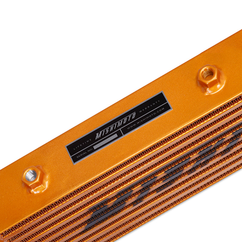 Load image into Gallery viewer, Mishimoto Universal Gold Z Line Intercooler  Overall Size: 28x8x3 Core Size: 21x6x2.5 Inlet / Outlet
