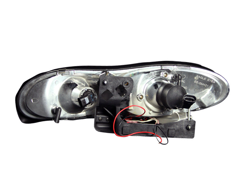 Load image into Gallery viewer, ANZO 1998-2002 Chevrolet Camaro Projector Headlights w/ Halo Black
