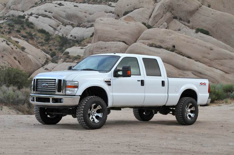 Load image into Gallery viewer, Fabtech 08-16 Ford F250/350/450 4WD 8 Lug 4in Budget Sys w/Dlss Shks
