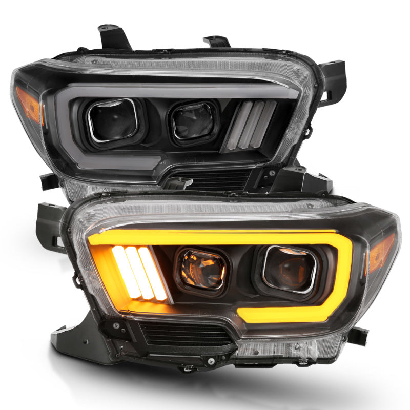 Load image into Gallery viewer, ANZO 2016-2017 Toyota Tacoma Projector Headlights w/ Plank Style Switchback Black w/ Amber
