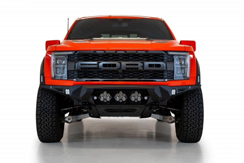 Load image into Gallery viewer, Addictive Desert Designs 2021+ Ford Raptor Bomber Front Bumper w/ 3 Baja Designs LP6 Light Mounts
