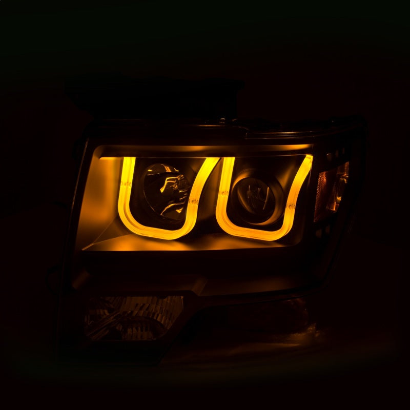 Load image into Gallery viewer, ANZO 2009-2014 Ford F-150 Projector Headlights w/ U-Bar Switchback Black w/ Amber
