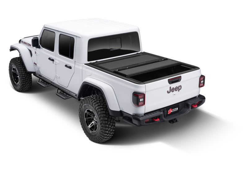 Load image into Gallery viewer, BAK 2020 Jeep Gladiator 5ft Bed BAKFlip MX4
