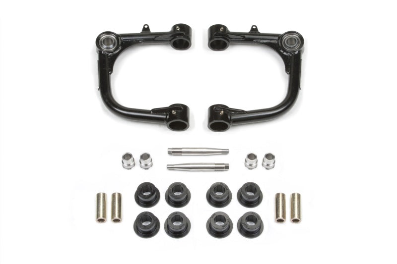 Load image into Gallery viewer, Fabtech 10-13 Toyota FJ 4WD 3in Uniball Upper Control Arm Kit

