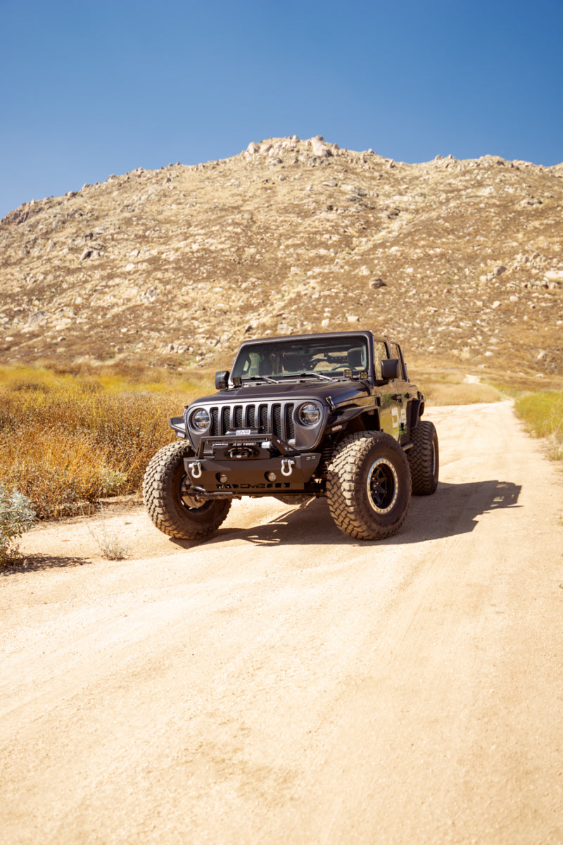 Load image into Gallery viewer, DV8 Offroad 07-23 Jeep Wrangler/Gladiator JT/JK/JL FS-25 Stubby Front Bumper w/Plated Bull Bar

