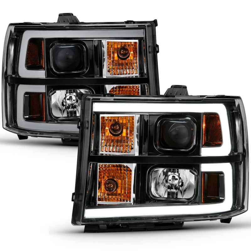 Load image into Gallery viewer, ANZO 2007-2013 Gmc Sierra 1500 Projector Headlight Plank Style Black w/ Clear Lens Amber
