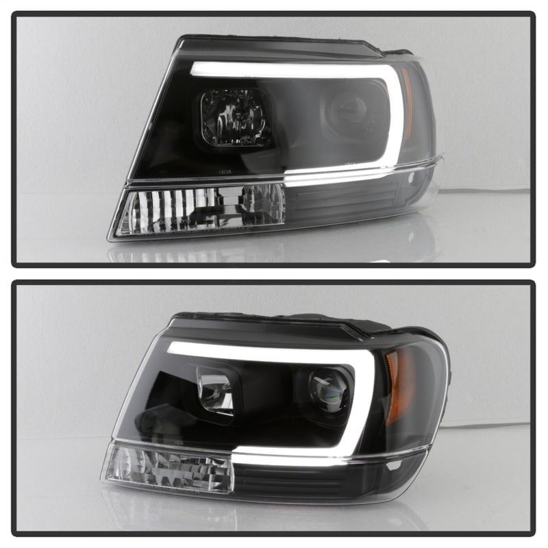 Load image into Gallery viewer, Spyder 99-04 Jeep Grand Cherokee Projector Headlights - Light Bar DRL LED - Black
