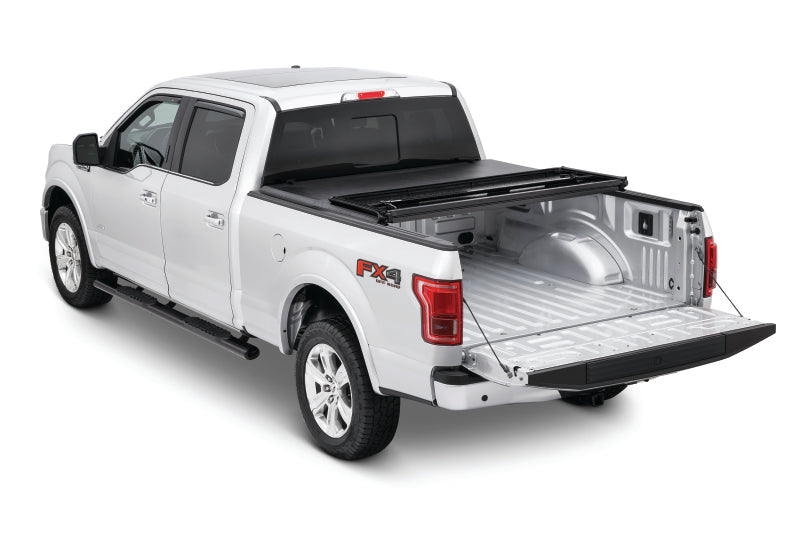 Load image into Gallery viewer, Tonno Pro 99-16 Ford Super Duty 6ft. 9in. Bed Hard Fold Tonneau Cover
