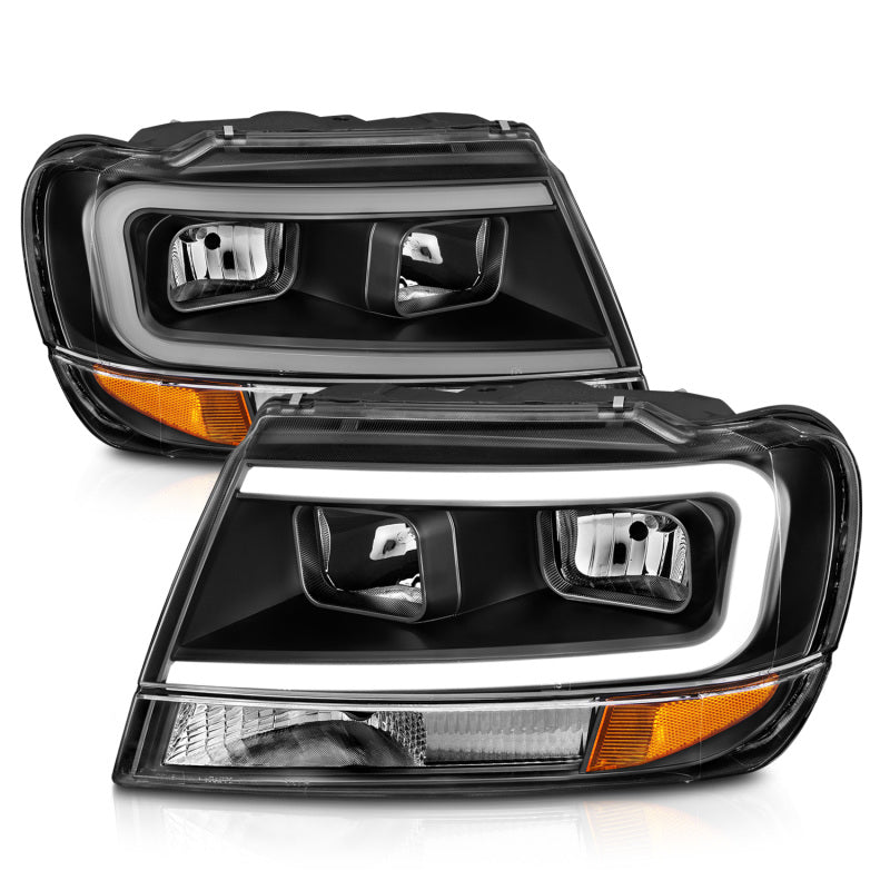 Load image into Gallery viewer, ANZO 99-04 Jeep Grand Cherokee Crystal Headlights - w/ Light Bar Black Housing
