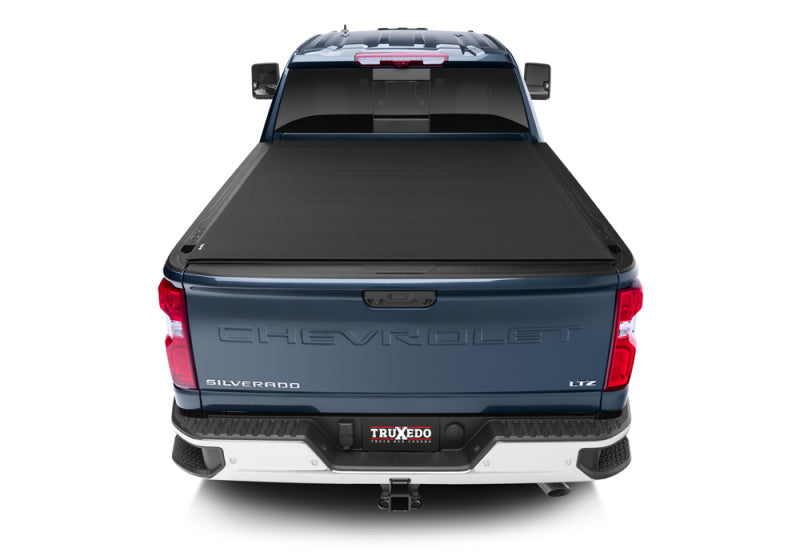 Load image into Gallery viewer, Truxedo 2020 GMC Sierra &amp; Chevrolet Silverado 2500HD &amp; 3500HD 6ft 9in Sentry CT Bed Cover

