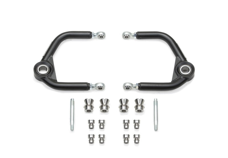 Load image into Gallery viewer, Fabtech 10-14 Ford F150 Raptor 4WD 0in/4in Uniball Upper Control Arm Kit
