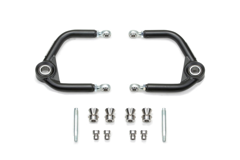 Load image into Gallery viewer, Fabtech 10-14 Ford F150 Raptor 4WD 0in/4in Uniball Upper Control Arm Kit
