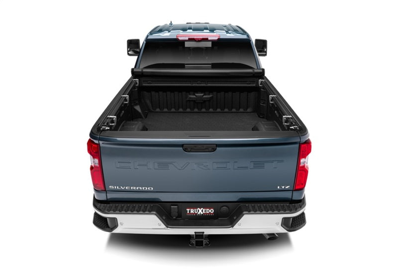 Load image into Gallery viewer, Truxedo 2020 GMC Sierra &amp; Chevrolet Silverado 2500HD &amp; 3500HD 6ft 9in TruXport Bed Cover
