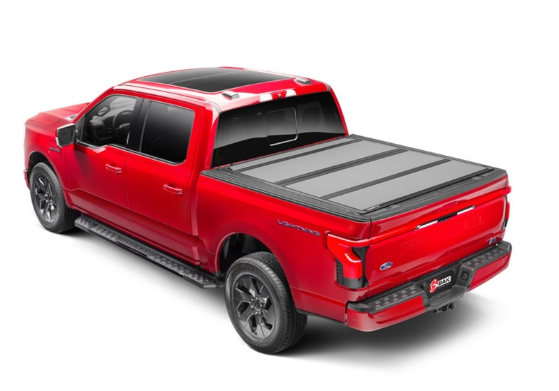 Load image into Gallery viewer, BAK 21-22 Ford F-150 (Incl. 2022 Lightning) BAKFlip MX4 5.7ft Bed Cover - Matte Finish
