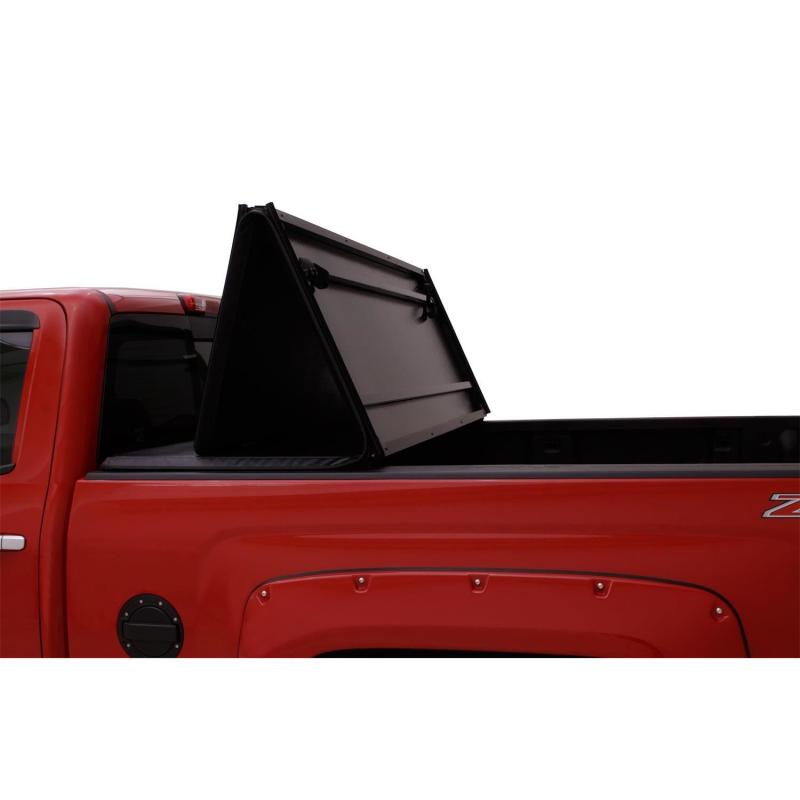 Load image into Gallery viewer, Lund 16-23 Toyota Tacoma (5ft. Bed) Hard Fold Tonneau Cover - Black

