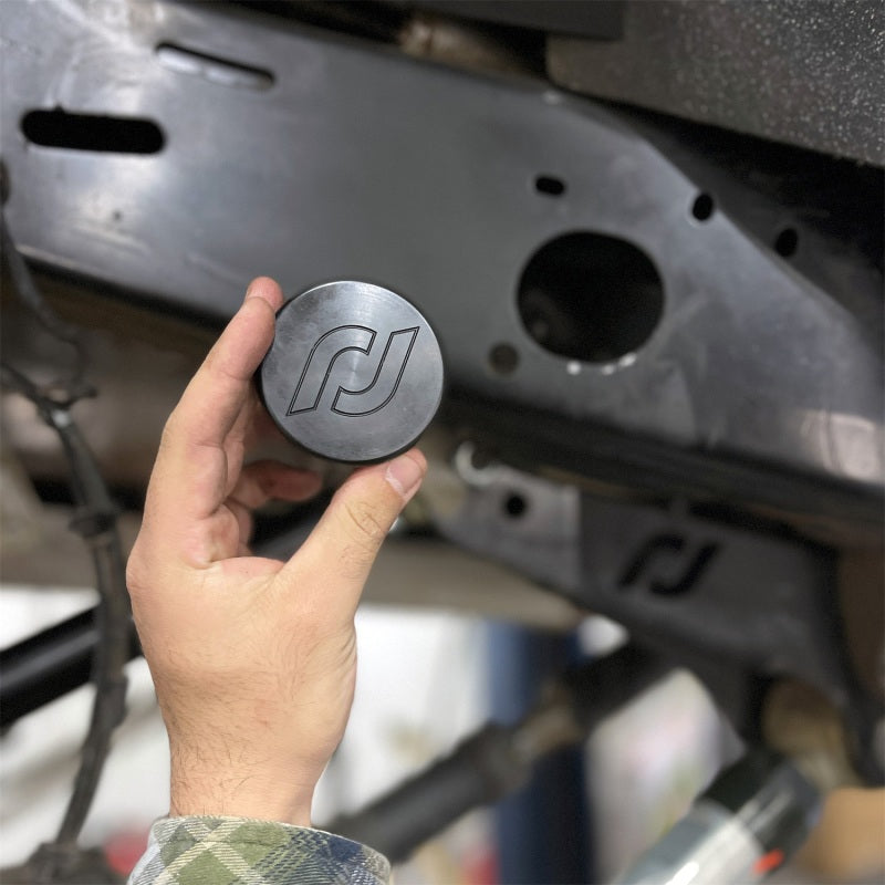 Load image into Gallery viewer, RockJock JL/JT Frame Rail Plugs Frame Behind Front Axle Centerline CNC Machined Black Delrin
