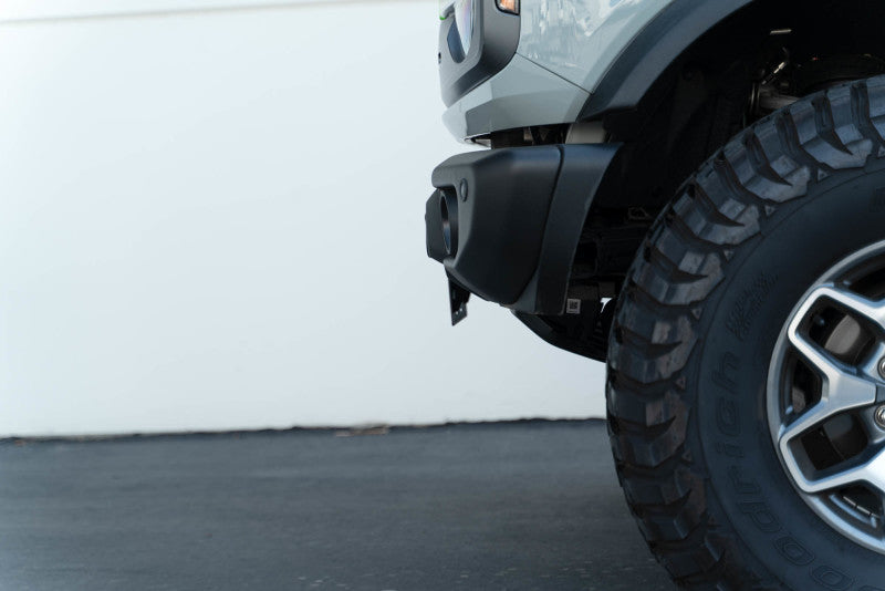 Load image into Gallery viewer, DV8 Offroad 21-23 Ford Bronco Capable Bumper Front License Plate Mount
