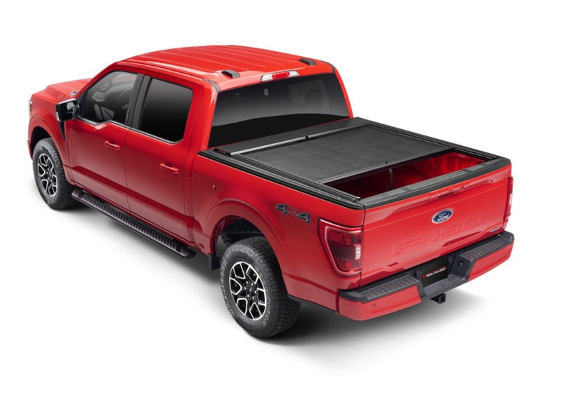 Load image into Gallery viewer, Roll-N-Lock 07-21 Toyota Tundra CrewMax (w/o OE Tracks - 66.7in. Bed) M-Series XT Retractable Cover
