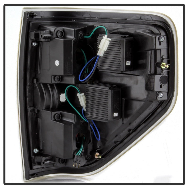 Load image into Gallery viewer, xTune 09-14 Ford F-150 Light Bar LED Tail Lights - Black (ALT-JH-FF15009-LBLED-BK)
