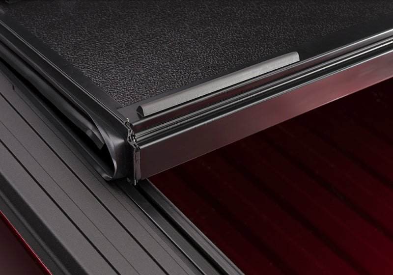 Load image into Gallery viewer, BAK 08-16 Ford Super Duty 6ft 9in Bed BAKFlip FiberMax
