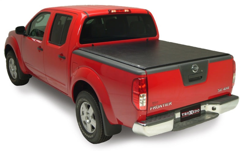 Load image into Gallery viewer, Truxedo 08-15 Nissan Titan 7ft Lo Pro Bed Cover
