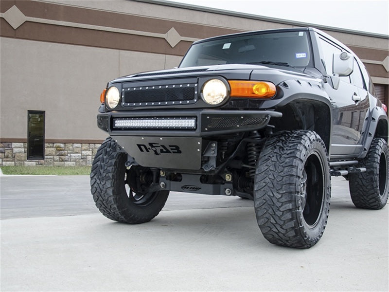 Load image into Gallery viewer, N-Fab M-RDS Front Bumper 06-17 Toyota FJ Cruiser - Tex. Black w/Silver Skid Plate
