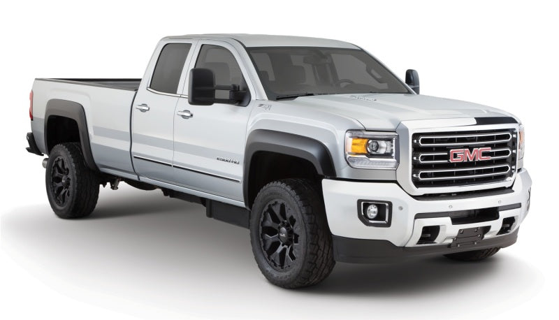 Load image into Gallery viewer, Bushwacker 15-18 GMC Sierra 2500 HD Extend-A-Fender Style Flares 4pc 78.8/97.6in Bed - Black
